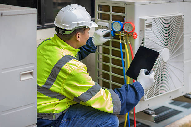 Professional Heat Pump Repair technician working in Rolling Prairie, IN